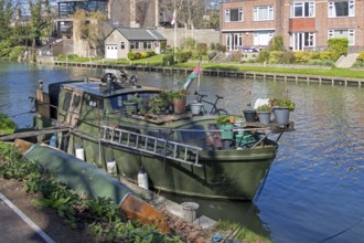Old boat lying on the bank, River Cam, Cambridge, England, Great Britain