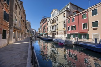 Colourful house facades reflected in the canal, Venice, Veneto, Germany, Europe