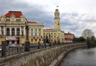 Romania, county area, Oradea, Grosswardein, town hall with bell tower at the river Repede, Crisul