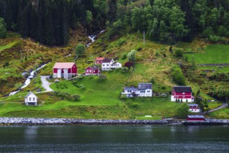 Mountains and Fjord over Norwegian Village, Olden, Innvikfjorden, Norway, Europe