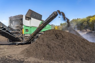 Composting plant, organic waste is composted, sorted by size, smaller parts are reused as compost,