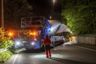 Transport of a 68 metre long, 22 tonne blade of a wind turbine, here in Schwelm, with a