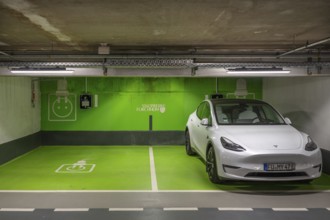 Electric filling station in an underground car park, Bavaria, Germany, Europe