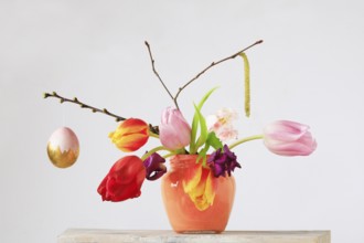 Picturesque still life with flowers and Easter egg, Germany, Europe
