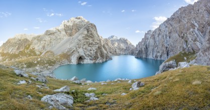 Turquoise mountain lake Kol Suu with rocky steep mountains, Kol Suu Lake, Sary Beles Mountains,