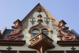 House gable with dragon figures, Heidelberg, Baden-Württemberg, Germany, Europe