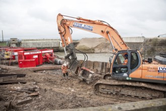 Engineering work on flood defences on the King's Sedgemoor Drain river at Dunball, near Bridgwater,