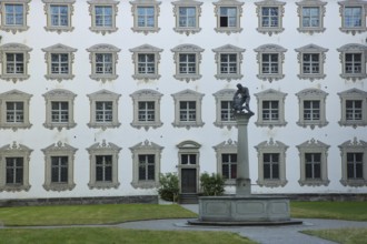 Inner courtyard with fountain and baroque illusion architecture, illusion painting, window, row,