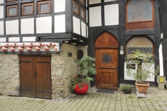Half-timbered house built in 1292 with wooden door and decoration, Bergstraße, Old Town, Limburg,