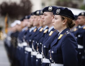 Female air force soldier and comrades of the guard battalion, taken during the final roll call of
