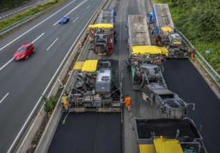 Essen, North Rhine-Westphalia, Germany, Road construction, Asphalt pavers and road rollers lay new,