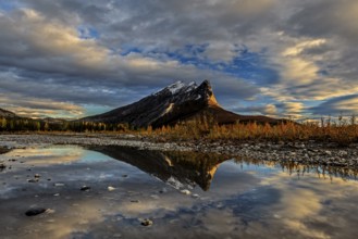 Clouds over mountain with reflection in lake, autumn, Brooks Range, Alaska, USA, North America