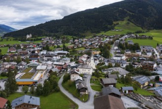 Drone image, residential buildings, view of village with parish church, Kaprun, Pinzgau, Salzburg