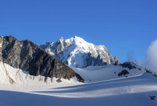 Summit of the Aiguille Verte, High alpine mountain landscape with glacier and mountain peak,