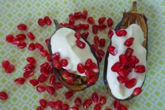 Mediterranean cuisine, roasted aubergines with pomegranate seeds and yoghurt, starter, healthy,