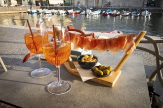 Aperol with ham, olives, Mediterranean, bistro, snack, restaurant, gastronomy, bar, drink, alcohol,