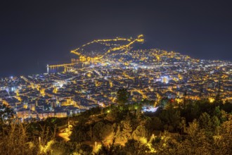 The lights of the city of Alanya on the Turkish Riviera glow in the evening, Alanya, Antalya,