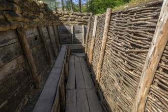 German WW1 trench showing fire step, wooden duckboards and woven wickerwork branches at the