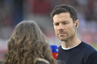SKY presenter Mara Mones portrait in interview with coach Xabi Alonso Bayer 04 Leverkusen