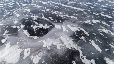 Frozen lake in early winter. Region of La Mauricie. Province of Quebec. Canada
