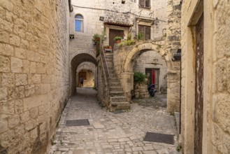 Narrow alley in the old town centre of Trogir, Croatia, Europe