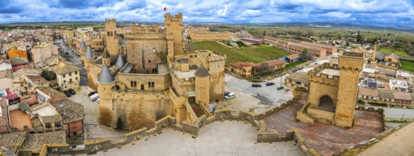 Capturing a panoramic view of the medieval royal palace of olite, a luxurious fortification in