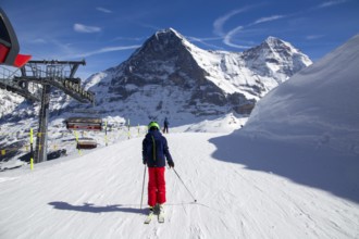 25 March 2024: Skiing against the backdrop of the north face of the Eiger in Grindelwald,