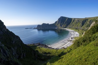 View of coastal landscape, cliffs with peak Måtind, Høyvika beach and sea, hike to the peak of
