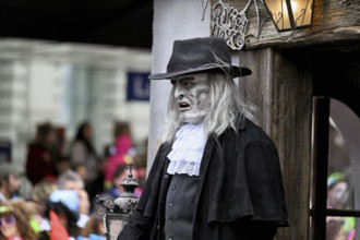 Person dressed up as a goth at the Wey guild on Rose Monday, Güdismäntig, Lucerne Carnival 2024,