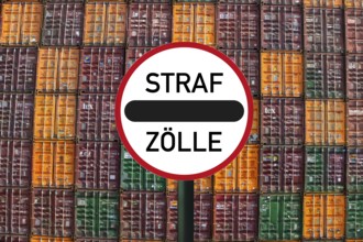 Modified customs sign with the symbolic inscription STRAFZÖLLE in front of shipping containers in a