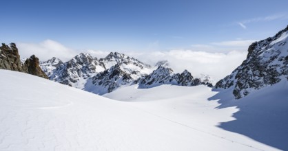 Rocky mountain peaks and glacier Vadret da Porchabella in winter, mountain landscape, alpine tour,