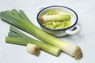 Leek, leek sticks and leek rings in a bowl