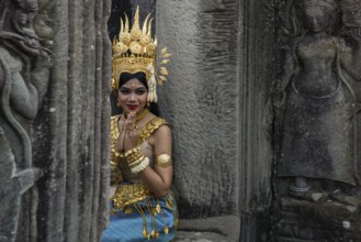 Young woman dressed as a temple dancer, Apsara, Bayon Temple, Angkor Wat, Angkor, UNESCO World