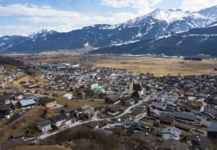 Drone shot, view of village with parish church, Piesendorf, Pinzgau, Salzburg province, Austria,