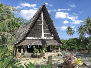 Traditional historical meeting house for men Tribal Chief Men Men's House between palm trees, in