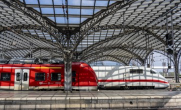 Cologne Central Station, ICE train and S-Bahn on the platform, North Rhine-Westphalia, Germany,