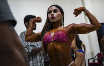Female participants gets ready backstage as they prepare for the 4th Ms Saraighat all India classic