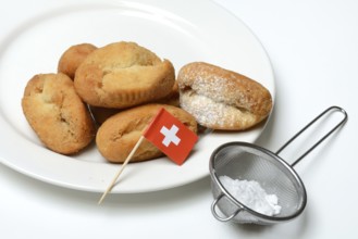 Schenkeli on a plate, sweet pastry for carnival time, Switzerland, Europe