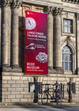Posters on the façade of the Bode Museum, Museum Island, Berlin