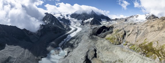 Aerial view, Alpine panorama, mountain landscape with glacier tongue Glacier de Cheilon and summit
