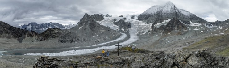 Aerial view, Alpine panorama, hiker at the summit, mountain landscape with glacier Glacier de