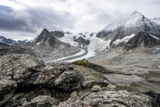 Mountain hut Cabane des Dix in front of glacier Glacier de Cheilon and summit Mont Blanc de