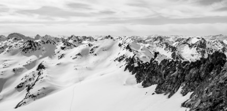 Mountain panorama with view of Scalettahorn summit, ascent to Piz Grialetsch in winter, Grisons