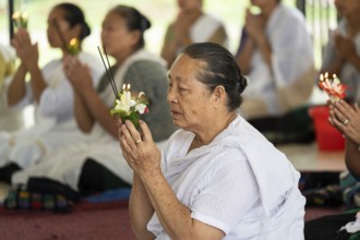 NAMSAI, INDIA.- APRIL 16: Devotees celebrate the vibrant Sangken Festival at Golden Pagoda in