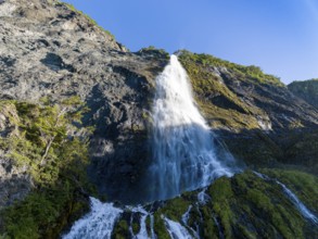 Waterfall at the Bay of Last Hope, fjords and mountains, Puerto Natales, Patagonia, Chile, South