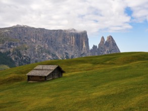Alpine hut in front of the Sciliar, Punta Santner, Dolomites, Alpe di Siusi, South Tyrol, Italy,