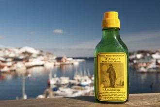 Bottle of cod liver oil, Tran, Å i Lofoten or Å for short, Lofoten, Northern Norway, Norway, Europe