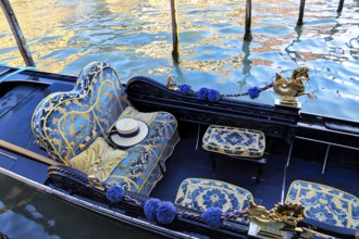 Luxury Gondola waiting for tourists near Rialto Bridge in Venice