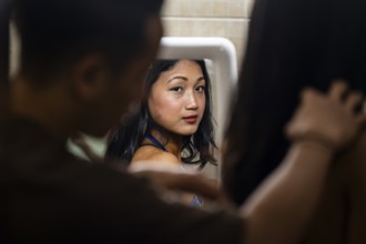 Female participants gets ready backstage as they prepare for the 4th Ms Saraighat all India classic