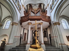 Interior view of Bonn Minster, bronze statue of St Helena with Klais organ in the west apse, Bonn,